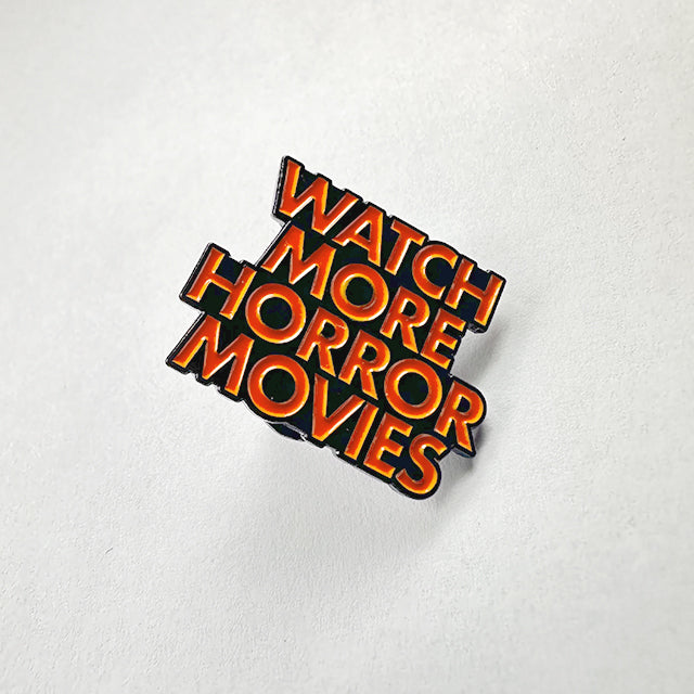 "WATCH MORE" SOFT ENAMEL ORANGE PIN