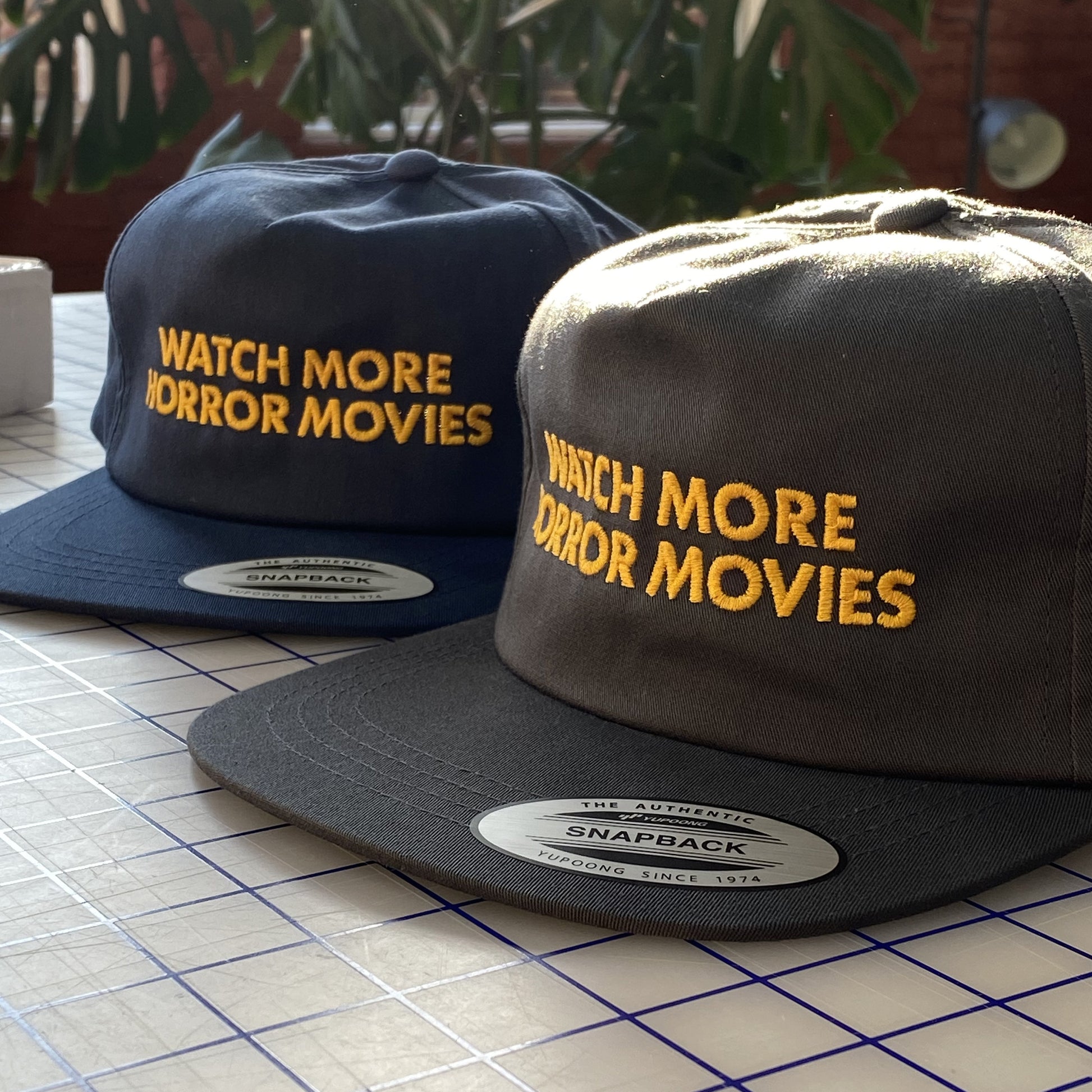 "WATCH MORE" SNAPBACK HATS
